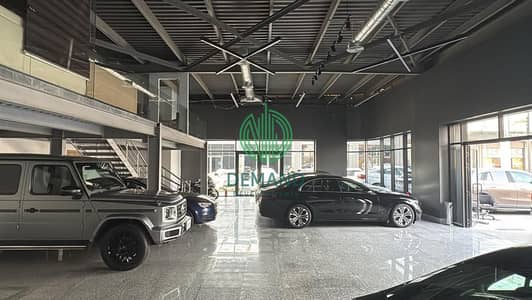 For rent car showroom 320 sqm fully finished with Ac's  in 6th of October City, on al wahat road