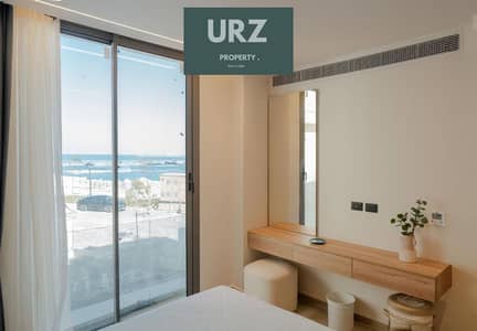 شالية Fully sea view بتشطيب كامل + ACs + kitchen  للبيع في راس الحكمة بخصم هائل وبالتقسيط المريح في الساحل الشمالي بالقرب من modon و مراسي واوجامي