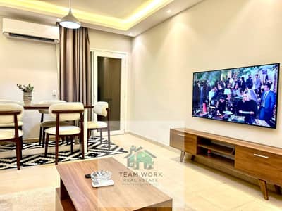 Ground floor apartment for rent in Garden Compound, The Address, in the heart of Sheikh Zayed City. Modern furnishings, fully air-conditioned. Suitabl