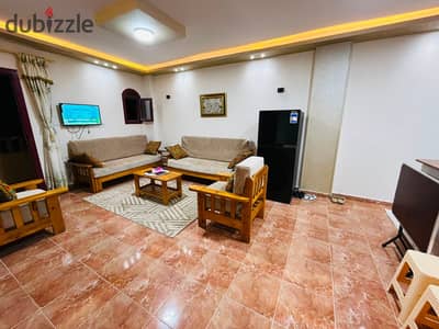 Luxury Apartment for Rent in the Best Location in the Second District. . Steps from Al-Hosari Mosque!  If you are looking for upscale housing, close to services, and complete comfort. . This apartment is designed specifically for you! ​ The strategic location (heart of the services): ​Second District - First Neighbourhood: A very vital and exceptional location.