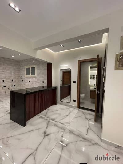 Luxury apartment for sale with exclusive hotel finishes in the finest locations in Egypt, Al-Riyisi Street, Al-Hijaz, recorded