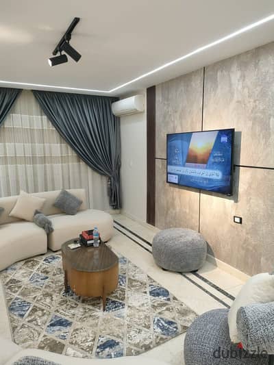 Furnished, air-conditioned hotel-style apartment next to City Stars, available for daily and monthly rent for families. Excellent location in Nasr Cit