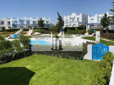 Distinctive townhouse with a direct lagoon view within Evia at Mountain View, Ras El Hekma.