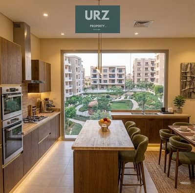 Corner apartment with a view of Center Park in Sarai New Cairo for sale with installments over 12 years and a low down payment Located on the Suez Ro