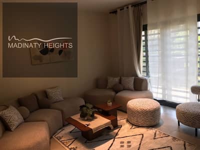 Furnished studio for rent in Privaldo Madinaty | Ground floor with garden and lake view