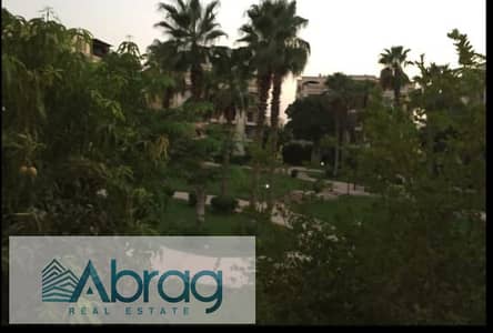 For sale, a 122m apartment with super luxury finishing inside the Al-Mohandessin Gardens Compound in Sheikh Zayed
