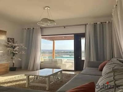 للبيع شاليه بجاردن  متشطب بالكامل  double view  pool & lagoons  فى مكادى هايتس - اوراسكوم فيو مميز على البحر الاحمر