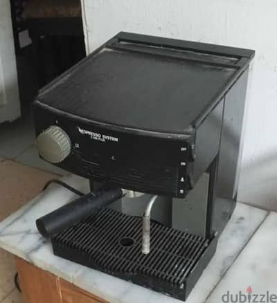 ماكينة تحضير القهوة نسبريسو سيستم سي 200 بلس