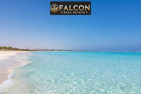 First row lagoon chalet, 58m², for sale in Silver Sands village, Sidi Heneish, next to Almaza Bay and near Fouka Road, in the best beach on the North
