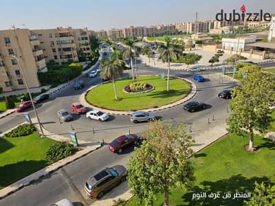 Apartment for sale open view of garden and square ready to move in Elevator available Close to services 3 bedrooms in Al Rehab 1 - Phase 1