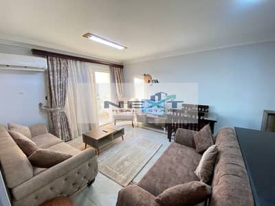 Furnished apartment for rent in one of Madinaty's most prestigious phases, B7.82 sq m apartment with 2 bedrooms, 1 bathroom, reception, kitchen, and