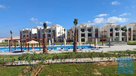 For Sale: Ground Floor Chalet in Gaia Ras El Hekma with a private garden and stunning direct pool view, just 3 minutes from the beach, immediate delivery, fully furnished and equipped with air conditioners.