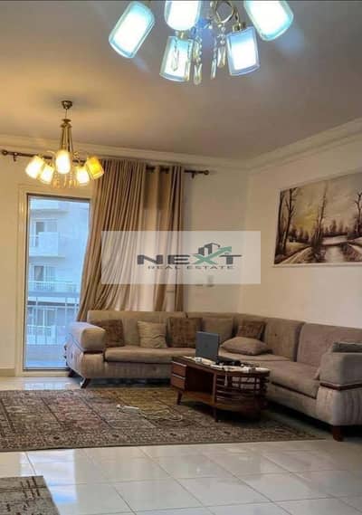 Furnished apartment for rent in Madinaty, 91 sq m, 2 bedrooms + 1 bathroom, ground floor, garden view, high-end finishing, modern furnishings, one min