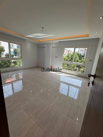 A distinctive apartment for sale with a sea view in a compound in Sheikh Zayed, next to Zed Towers.