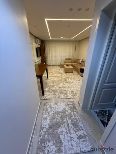 For sale, a 107 meter apartment with furniture and air conditioning in Madinaty B12 installments and without mandatory club