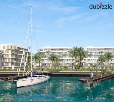 Twin house villa for sale in installments, with a direct view of the marina in the South Med project on the North Coast, at the lowest price