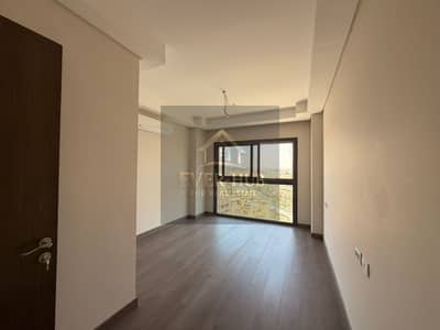 Apartment for rent in Sheikh Zayed, Zed Compound, two bedrooms, sea view, first occupancy, kitchen and air conditioning.