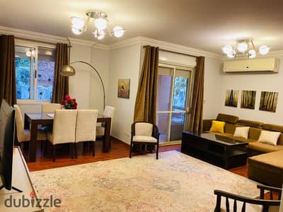 Furnished apartment for rent on the ground floor with a garden in Al Rehab, Phase Four