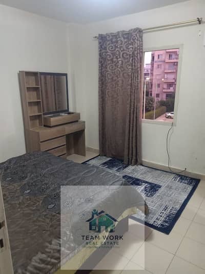 Furnished apartment for sale in Al-Mustaqbal Buildings at a very bargain price. Prime location with a landscape view. Air-conditioned. Sale includes f