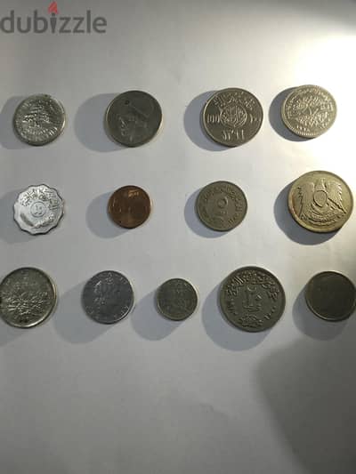 مجموعة عملات معدنية قديمة(مصرية،لبنانية،سعودية،. . . ) 13قطعة
