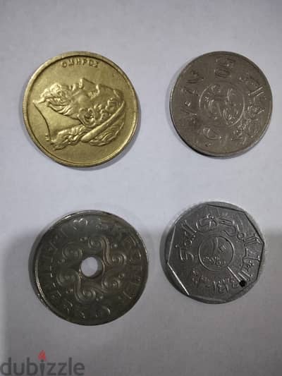 4 عملات قديمة ( سعودية ، يمنية ، يونانية ، دنماركية )
