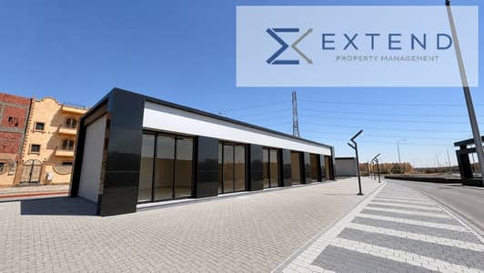 A distinctive façade in October Gardens, a clothing store for rent amidst residential complexes with a continuous daily flow of customers