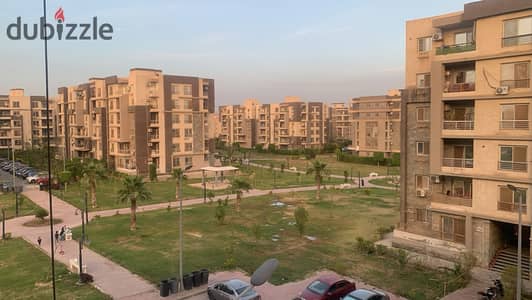 For sale, a 130 square meter apartment on the third floor with a distinctive landscape view in Dar Masr Compound, Sheikh Zayed City, Block 16