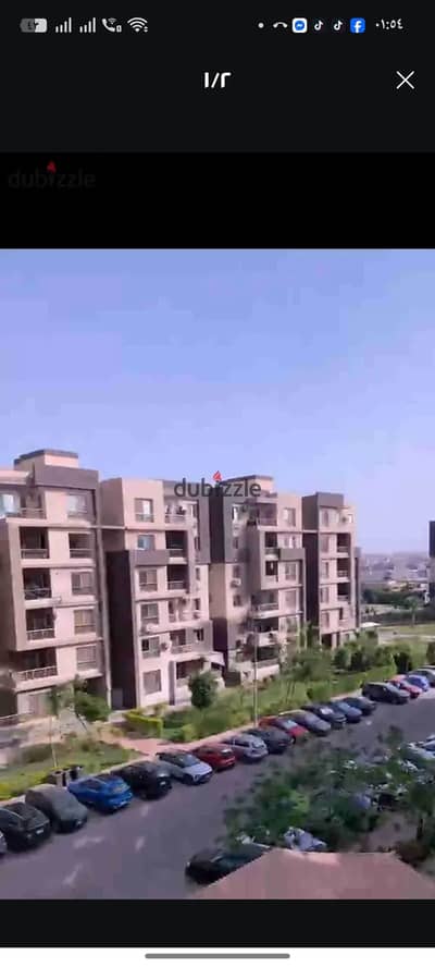 For rent, an apartment of 130 meters on the fifth floor, a corner unit facing the sea in the Dar Misr compound, district 16, Sheikh Zayed