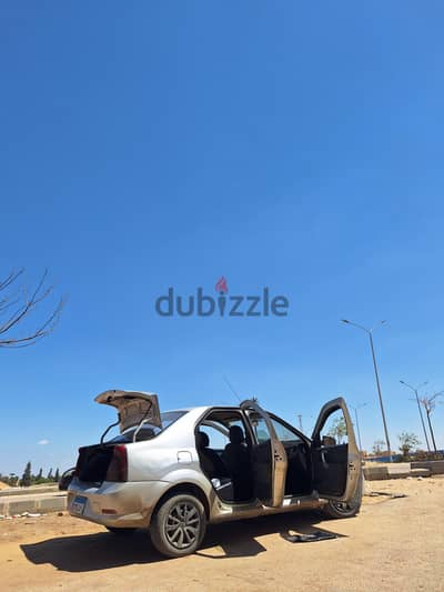 رينو لوجان 2014