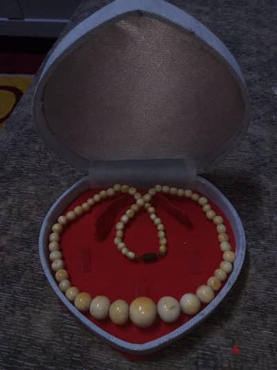 عقد عاج اصلى