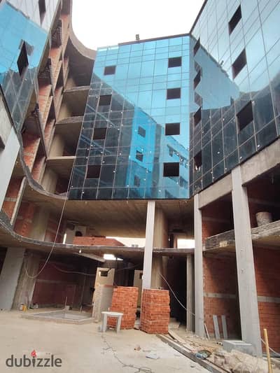 Commercial space available for immediate occupancy in Sheikh Zayed Mall with a prime view.