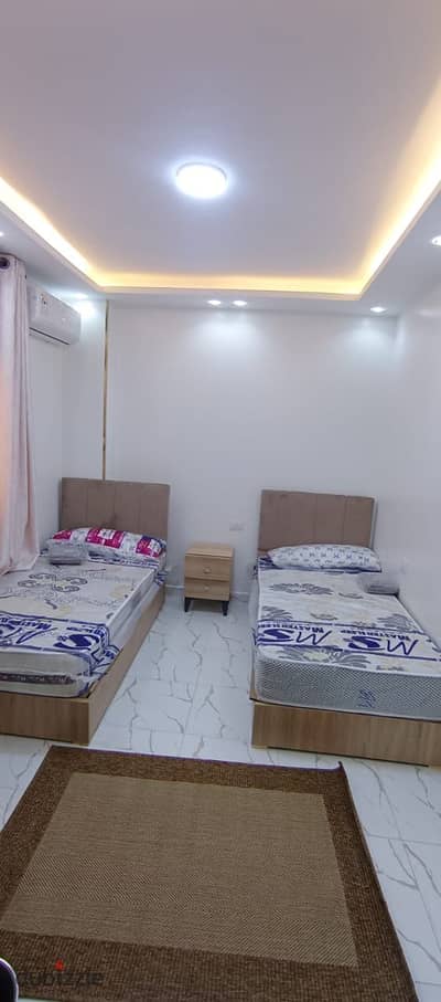 Furnished studio for sale in 6th October, First District, steps to the parking lot, Al-Hosari and the University, steps to Mall of Egypt, a third of an hour to Hyper and Zayed