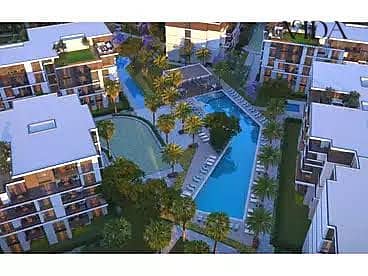 Own a 103 sqm Apartment in Tesla Island – Directly on Al Wahat Road Own a 103 sqm Apartment in Tesla Island – Directly on Al Wahat Road