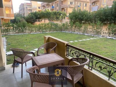 Ground-floor apartment with a private garden for rent at the best price, fully furnished with hotel-style furnishings, in Al Khamayel, Sheikh Zayed.