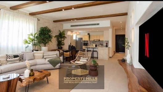 Receive a furnished 4-bedroom apartment with immediate air conditioning next to Cairojet with an open landscape view in Old Sheikh Zayed