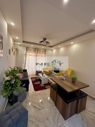 Furnished apartment for rent in Madinaty, 82 sq m, 2 bedrooms + 1 bathroom, ground floor, garden view, high-end finishing, modern furnishings, minutes