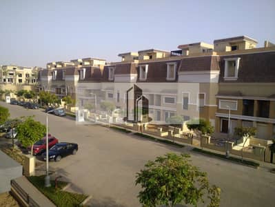 With great down payment and near delivery own a villa with a garden in a prime location next to Madinaty in Sarai Mostakbal City
