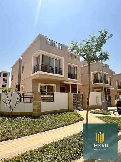 Twin house for sale, ready for immediate occupancy, with a 30% discount, 5% down payment, and installments over 7 years. Located in Taj City Compound,