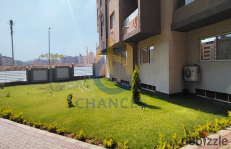 Ground floor apartment with garden for sale in Emerald Compound, Shatr 10, Zahraa El Maadi, with a landscape view.