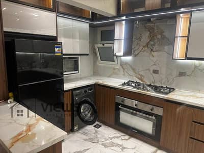 شقة ارضي للايجار 140م + 60م حديقة مفروشة بالكامل بكمبوند ماونتن فيو اى سيتي Mountain view i city