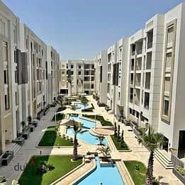 Apartment for sale with cash discount, finished with air conditioning and kitchen in the most distinguished location in Al Shorouk, in front of Madina