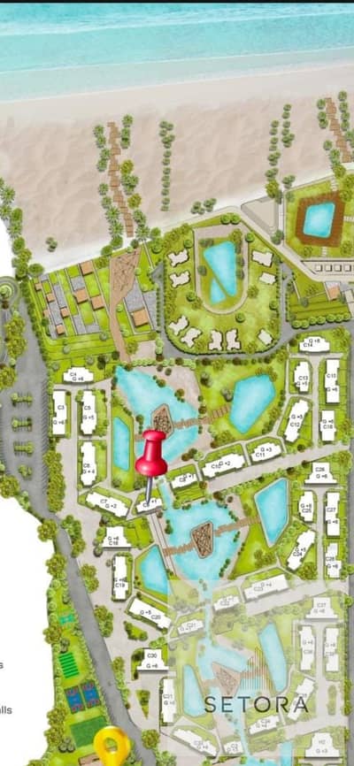 Twin house, first row on the sea, ultra-super deluxe finishing, fully serviced village at kilometer 58, Hilton hotel is located in the project.