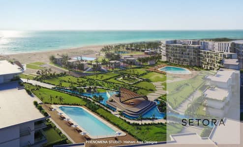 Twin house, first row on the sea, ultra-super deluxe finishing, fully serviced village at kilometer 58, Hilton hotel is located in the project.