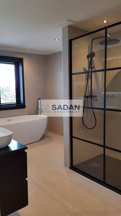 Apartment for sale with a prime view in Sarai Compound, New Cairo, in front of madinty