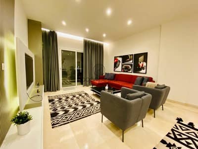 One of a Kind Fully Furnished Apartment in Mivida Boulevard with Upgraded Emaar Finishing Walk In Closet Maid Room Open Kitchen and Premium Living