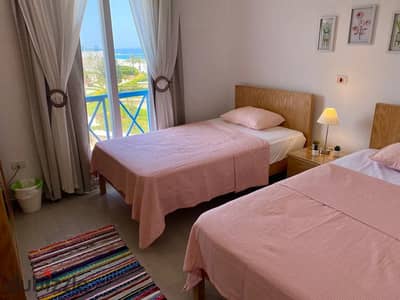 Receive a finished chalet with a view of the lagoon and the sea in Mountain View Ras El Hekma next to Swan Lake