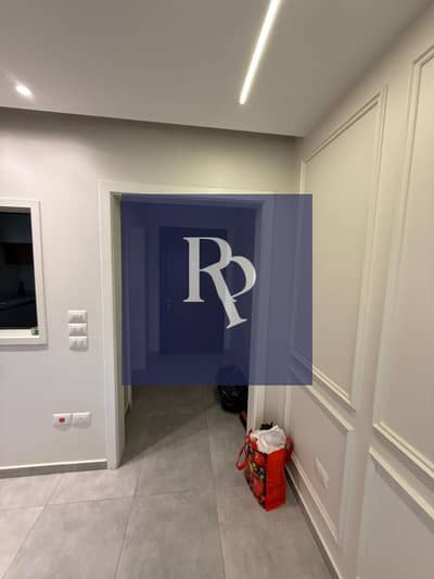 A distinguished apartment for rent with kitchen in Taj Sultan - Taj City Compound on the Suez Road, 5 minutes from the ring road and Nasr City