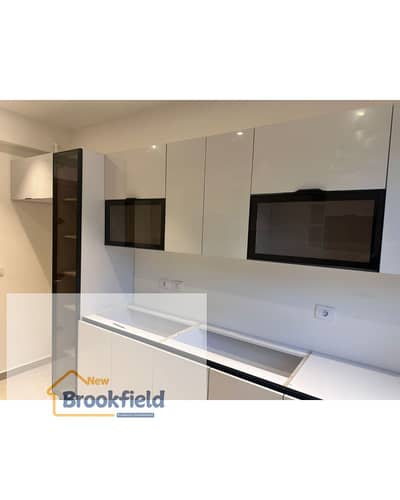 شقه للايجار بالمطبخ والتكييفات فى كمبوند ديستريكت 5 بالتجمع الخامس تشطيب الترا سوبر لوكس Apartment for Rent with Kitchen and ACs in District 5