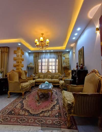 Apartment for sale in a very distinctive location, First District - 6th of October City - fully finished with a northern facade
