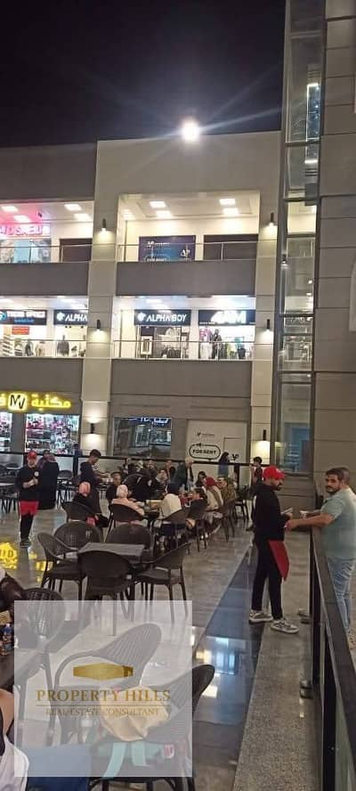 اخر محل للبيع امام الجامعه الامريكيه مباشره دور أرضي والسعر بالتقسيط